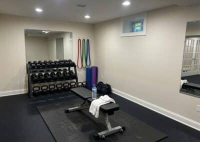Rubber Flooring Used In A Basement Home Gym In Connecticut.