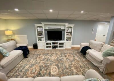 Finished Basement Remodeling Project In Berlin Ct With Modern Lighting And Flooring.